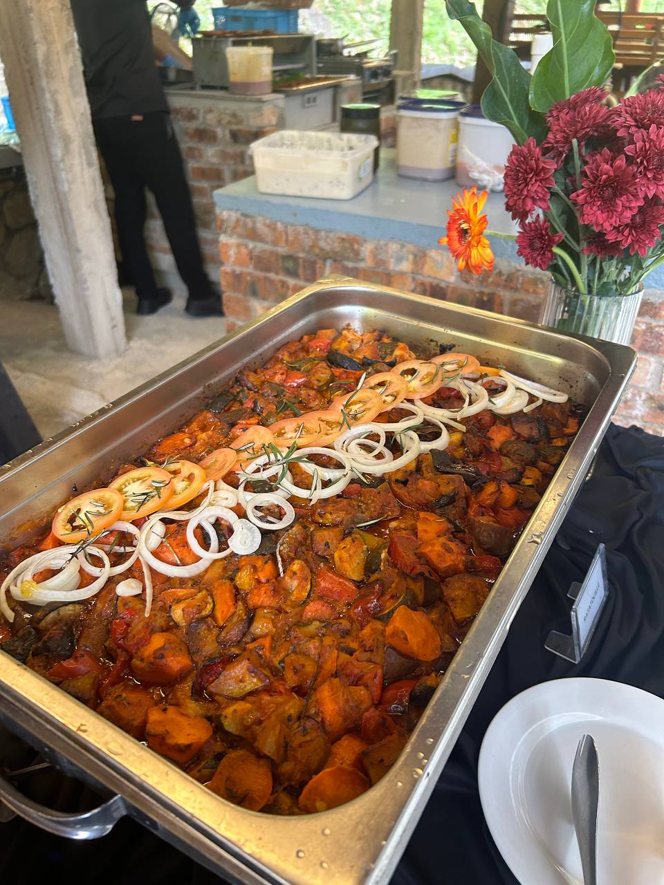 Freshly prepared Asian buffet catering spread for large corporate function