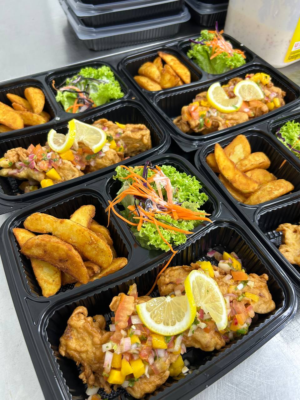 Freshly prepared Asian buffet catering spread for large corporate function