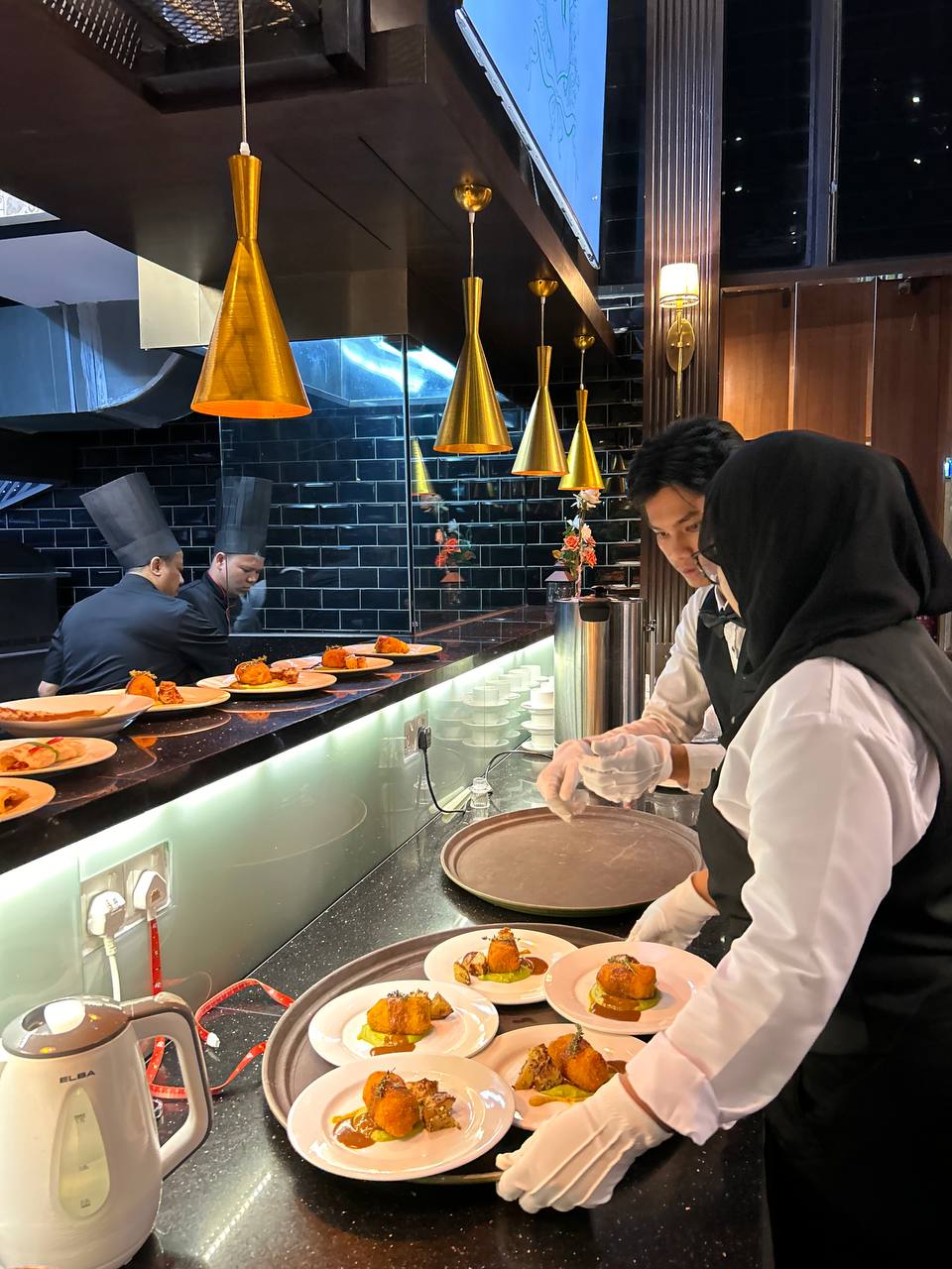 Colorful buffet catering presentation with Malaysian cuisine and finger food