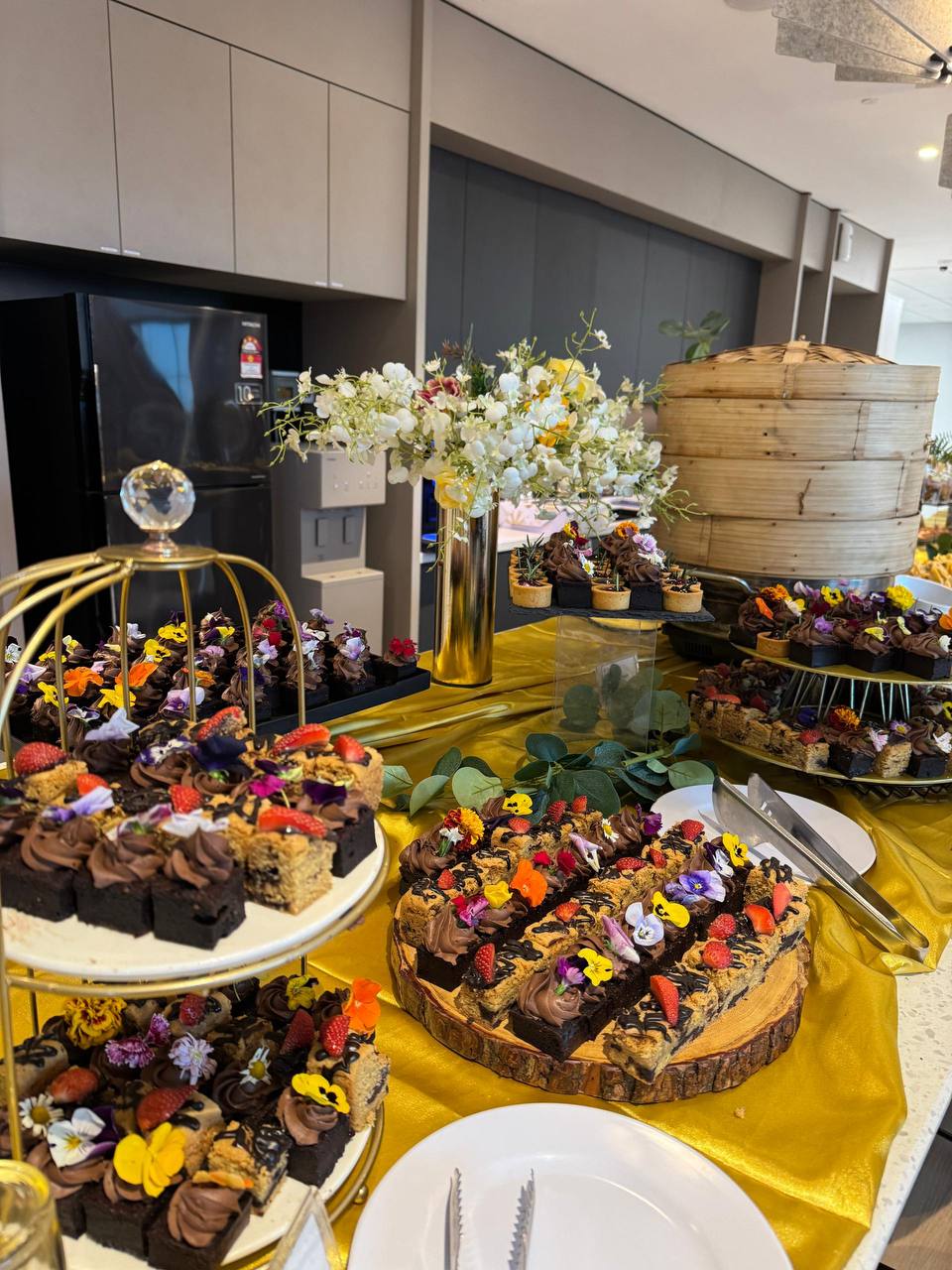 Colorful buffet catering presentation with Malaysian cuisine and finger food