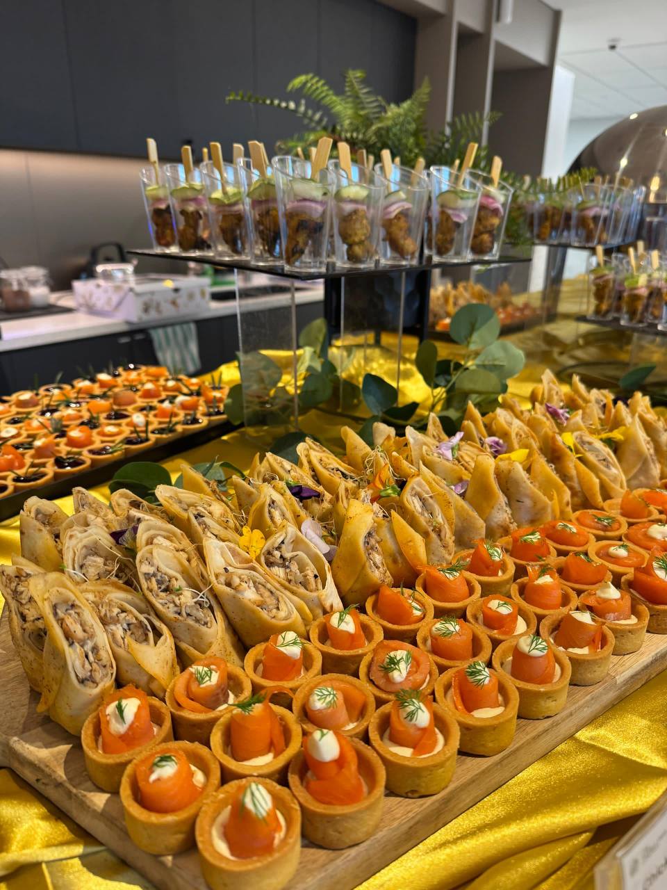 Colorful buffet catering presentation with Malaysian cuisine and finger food